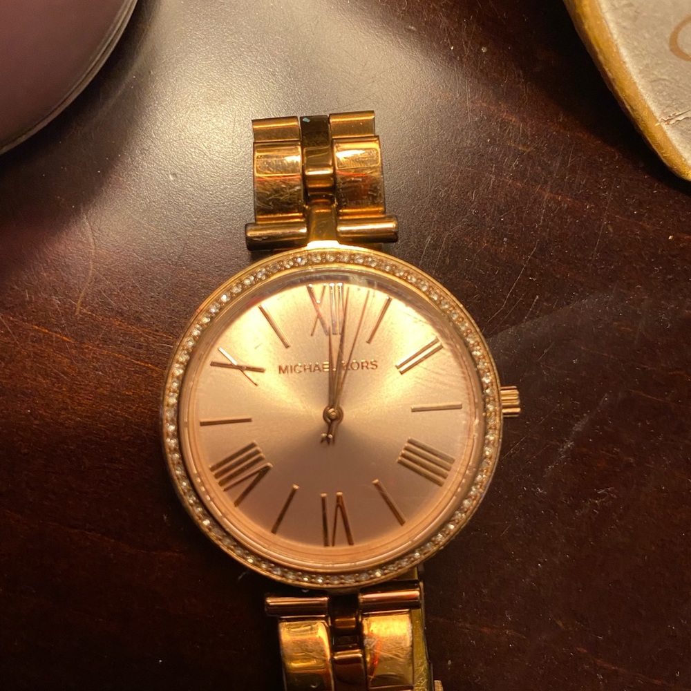 Women’s Michael Kors watch.